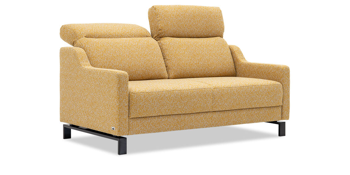 EVIA - 2,5 Platz Sofa seitliche Ansicht mit Kopfteilverstelung in Stoff Höpke Paradiso Fares gelb meliert